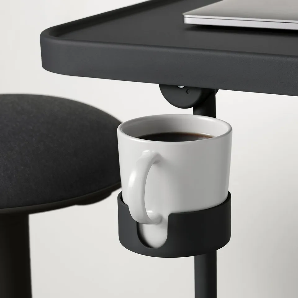 Black laptop stand with adjustable height and angle, featuring a built-in cup holder attached to the side.