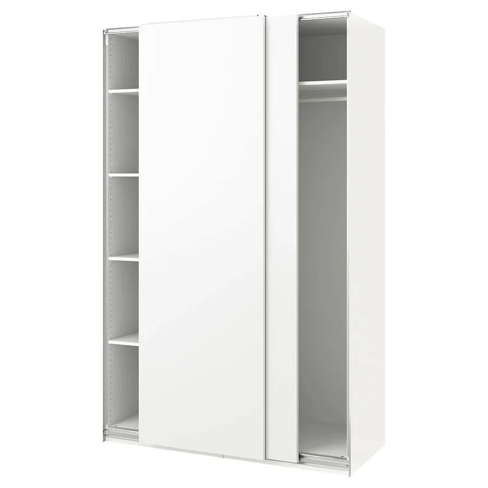 A white PAX wardrobe with sliding doors and multiple shelves.