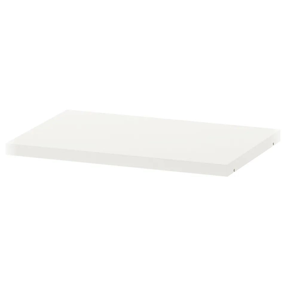 White rectangular shelf, flat surface, simple design, made of particleboard with plastic edging.