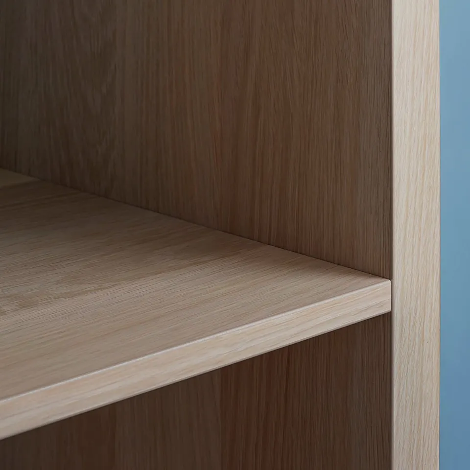 KALLAX light brown wooden shelf, rectangular, with smooth surface and grainy texture.