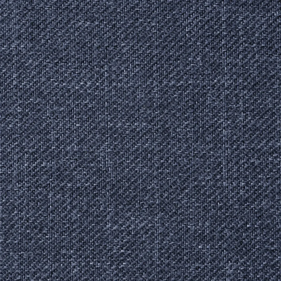 Close-up of grey, textured fabric. Soft and warm, showcasing melange weave pattern. Part of an upholstered bed frame.