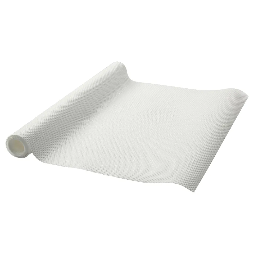 VARIERA drawer mat: white, textured, flexible plastic sheet for protecting and organising kitchen drawers.