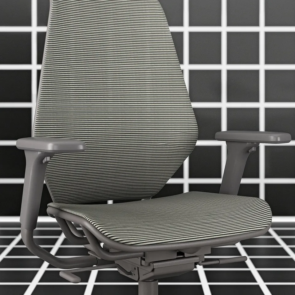 Modern, black office chair with mesh back. Adjustable armrests, headrest, and lumbar support. High back design with metal base and castors.