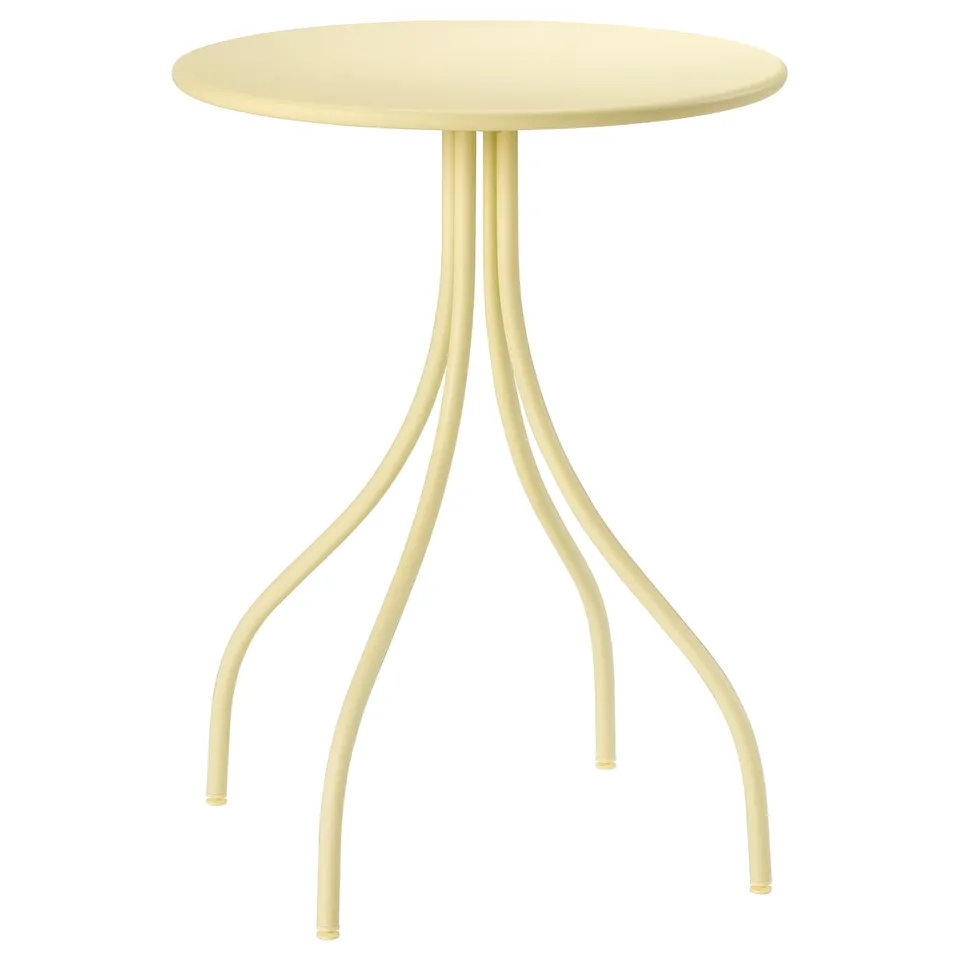 Yellow TÅNEBRO steel table, round top, curved legs, modern design.