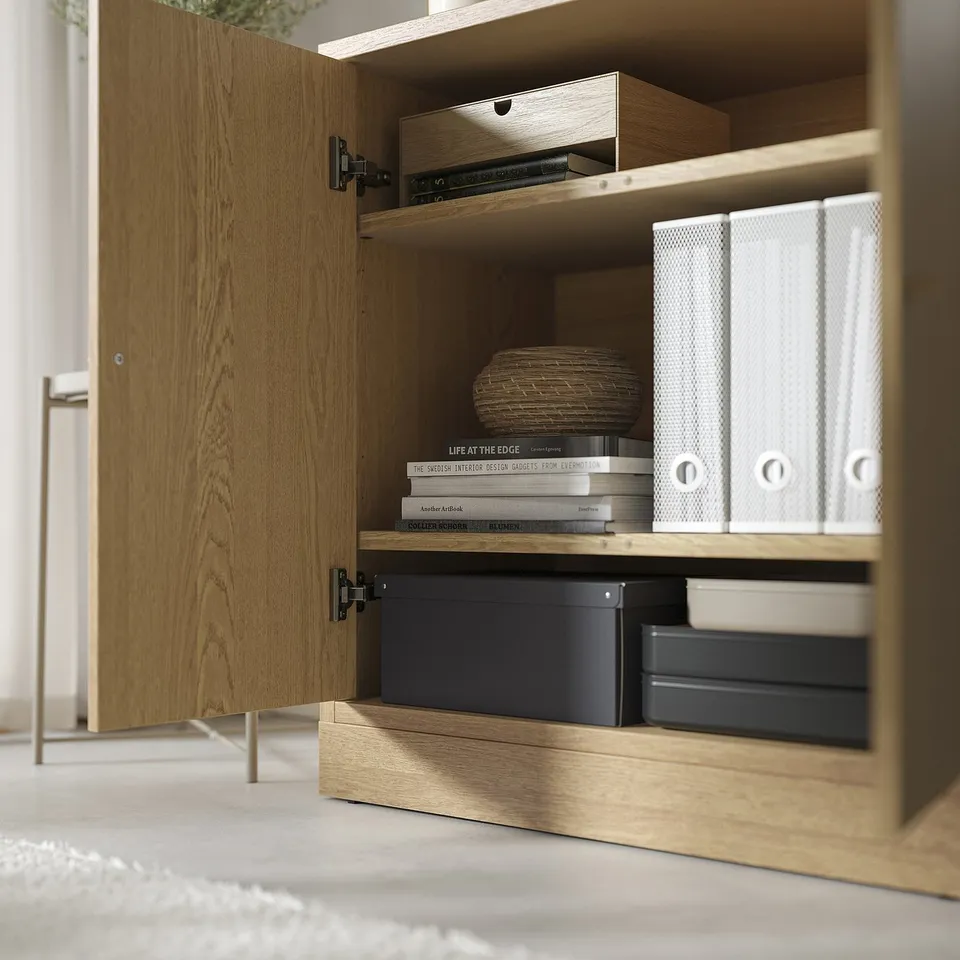 Wooden cabinet with adjustable shelves, soft-closing doors, and integrated handles.