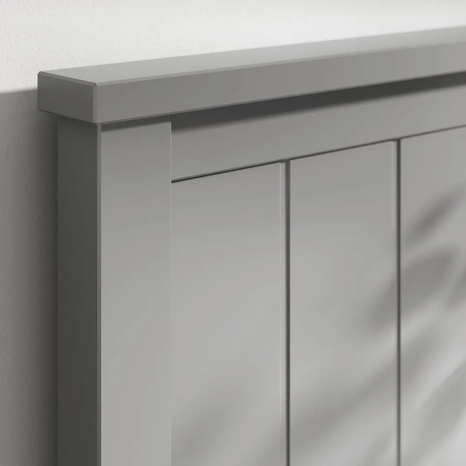 Clear close-up of a modern bed frames corner, showing sleek design and sturdy craftsmanship.