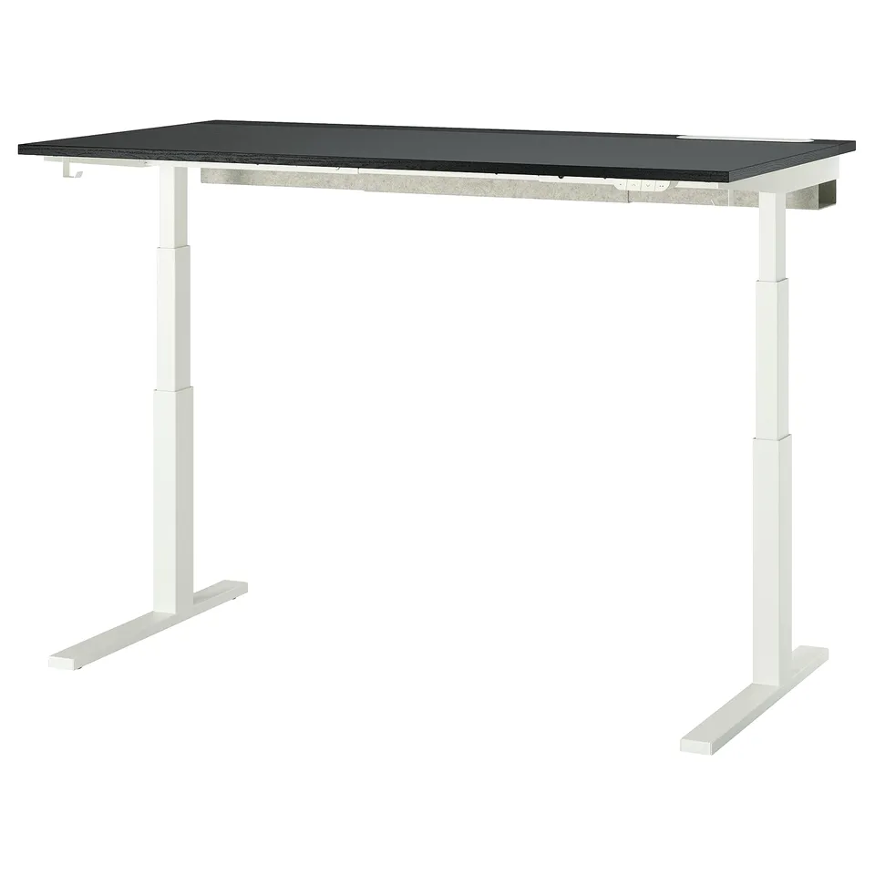 The MITTZON sit/stand desk in black with a white frame.