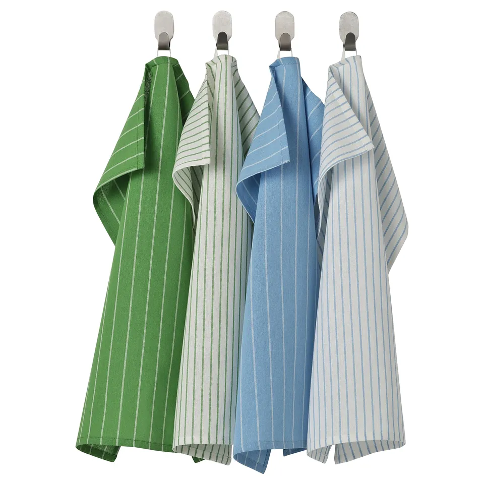 Four striped towels in green, grey, blue, and light blue hang neatly.