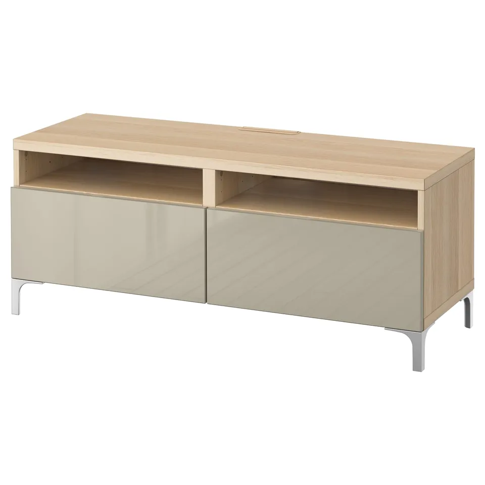 Light oak wooden tv stand with beige drawers, minimalist design.