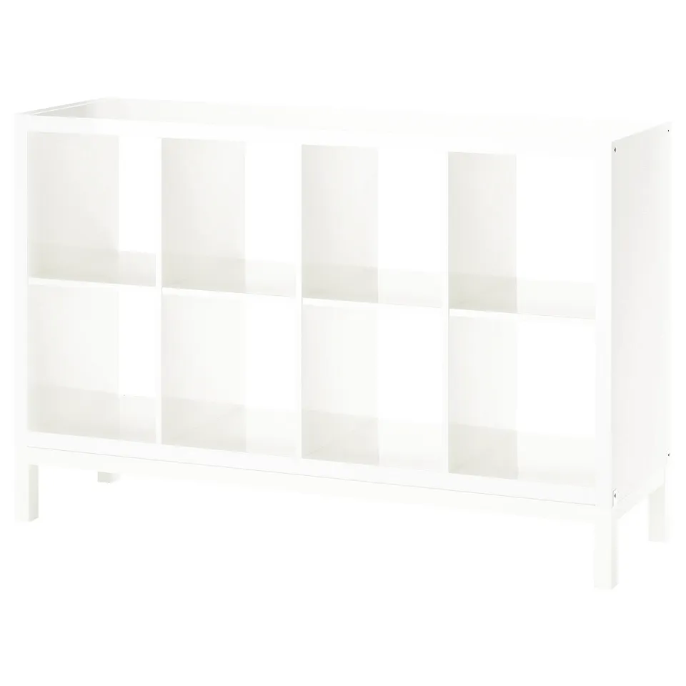 A white KALLAX shelving unit with multiple open cubes, supported by an underframe for an airy look, ideal for storage and display.