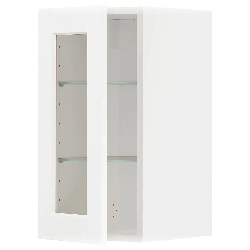 A white METOD kitchen cabinet with glass doors and shelves.