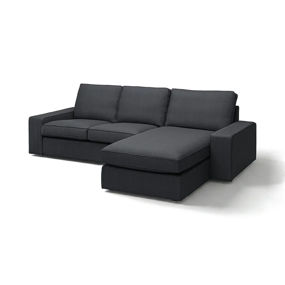 Modern dark grey sectional sofa with chaise, low armrests, and plush cushions.