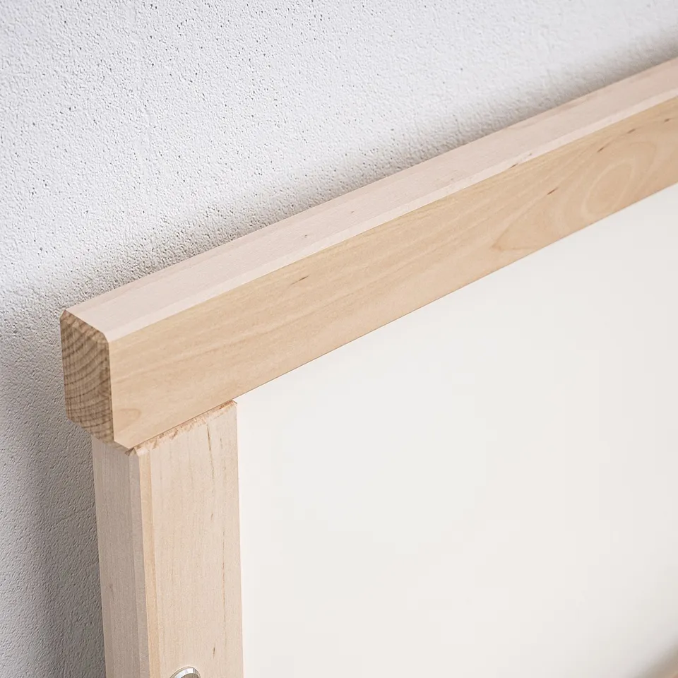 Close-up of well-crafted wooden bed frame corner, showcasing sturdy beech joints.
