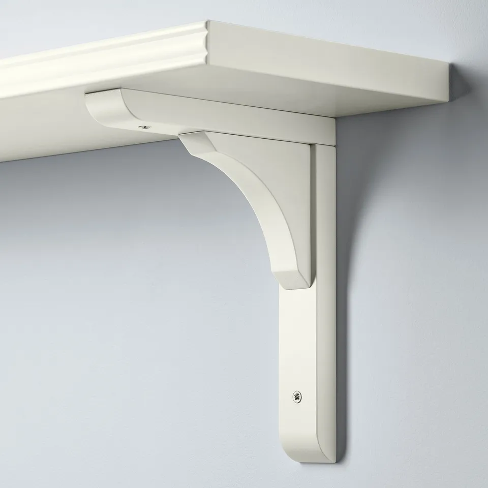 White wall-mounted shelf bracket, reversible supporting 20 or 30 cm deep shelves.