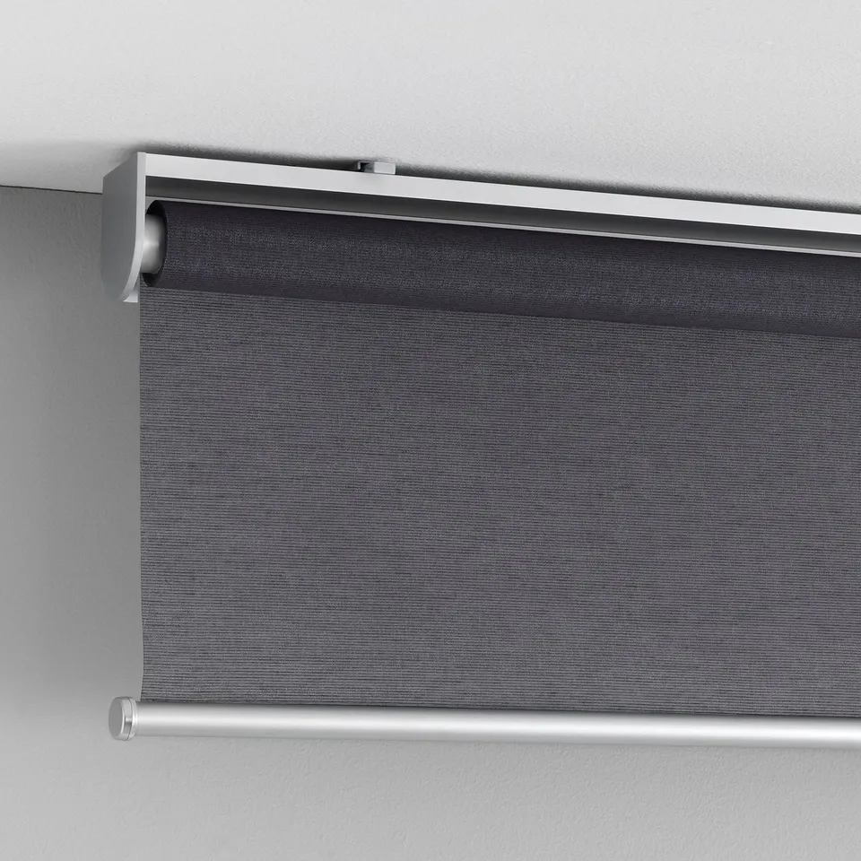 A cordless, roller-blind with soft closing function, mounted inside a window recess.