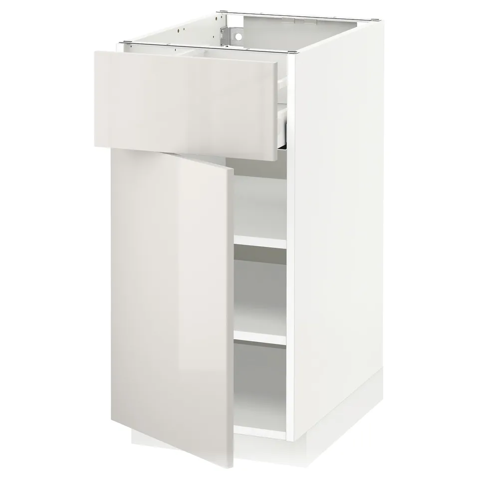 White METOD kitchen cabinet with glossy finish and adjustable shelves.