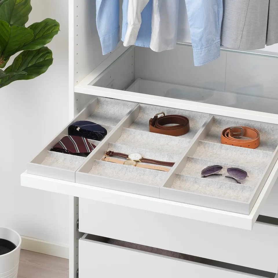 Organised wardrobe drawer with accessories