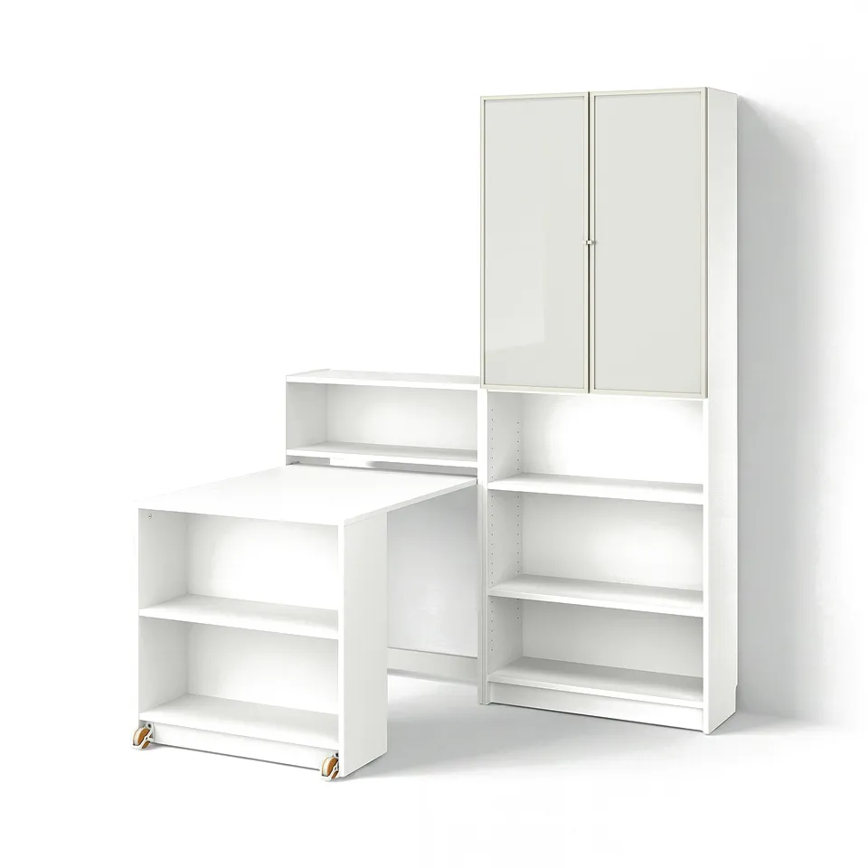Displays a white BILLY bookcase set with both open and closed storage, featuring a foldable table on casters for flexibility and functionality.