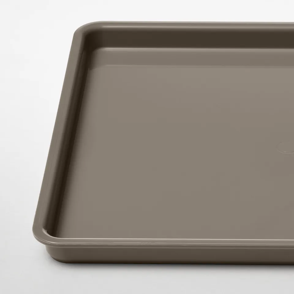Flat, square storage tray with shiny, even surface; appears durable and high quality.