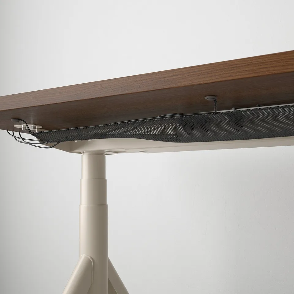 Desk with adjustable height and cable management. Pictured with digital control.