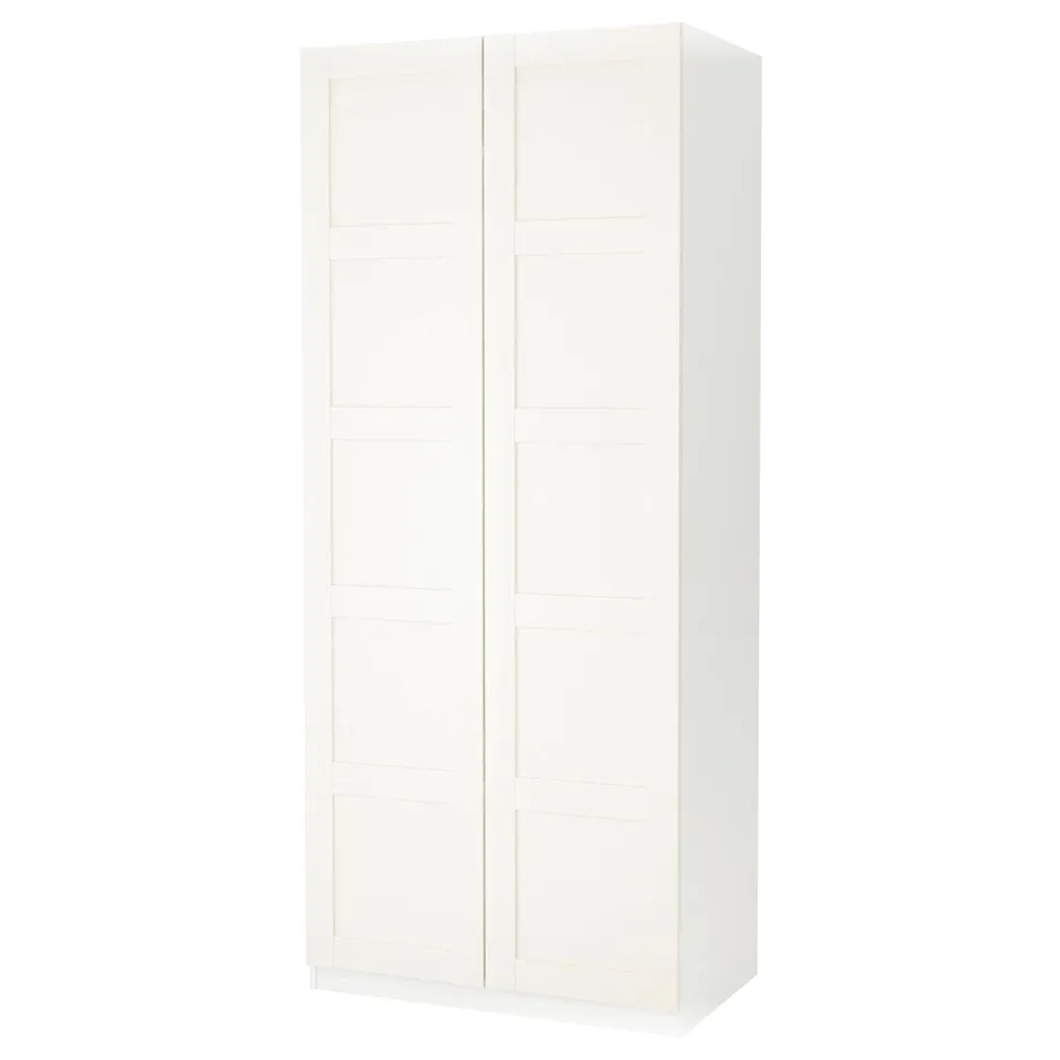 White PAX wardrobe, sleek and tall, simple design, two doors.