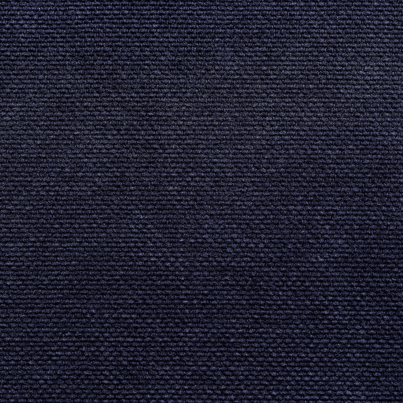 Dark grey upholstered fabric in intricate weave pattern, highlighting texture and inviting touch.