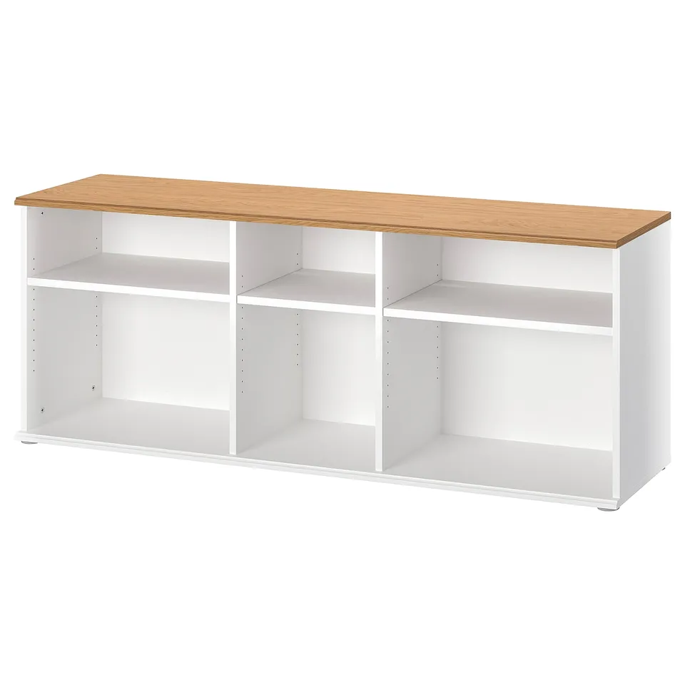 The SKRUVBY tv bench in white with a natural oak top. Rectangular, open shelves for storage and cable management. Modern, clean design.