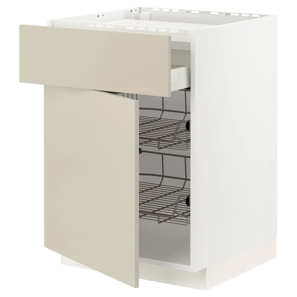 A white METOD kitchen cabinet with a beige drawer, featuring metal shelves and a modern design.