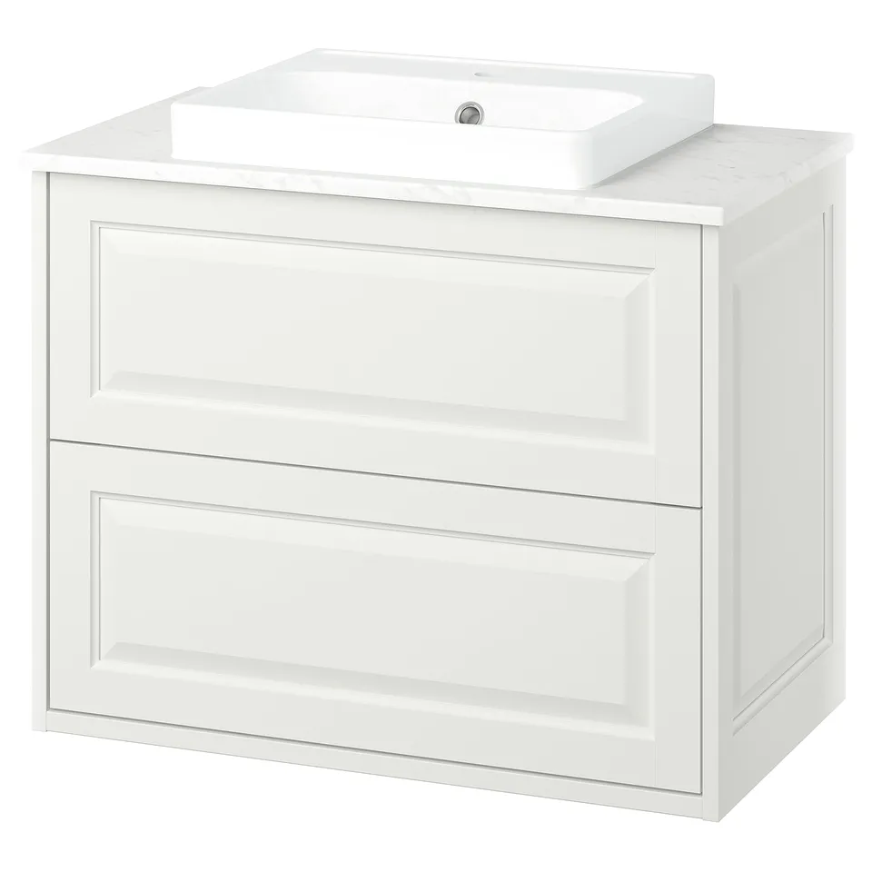 TÄNNFORSEN white bathroom vanity. Elegant design with bevelled panels, marble countertop, ceramic sink. Wall-mountable with drawer storage.