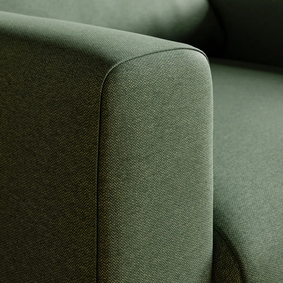 Close-up of a modern, high-quality upholstered armchairs armrest and seat, showcasing its soft, durable fabric and comfortable design.