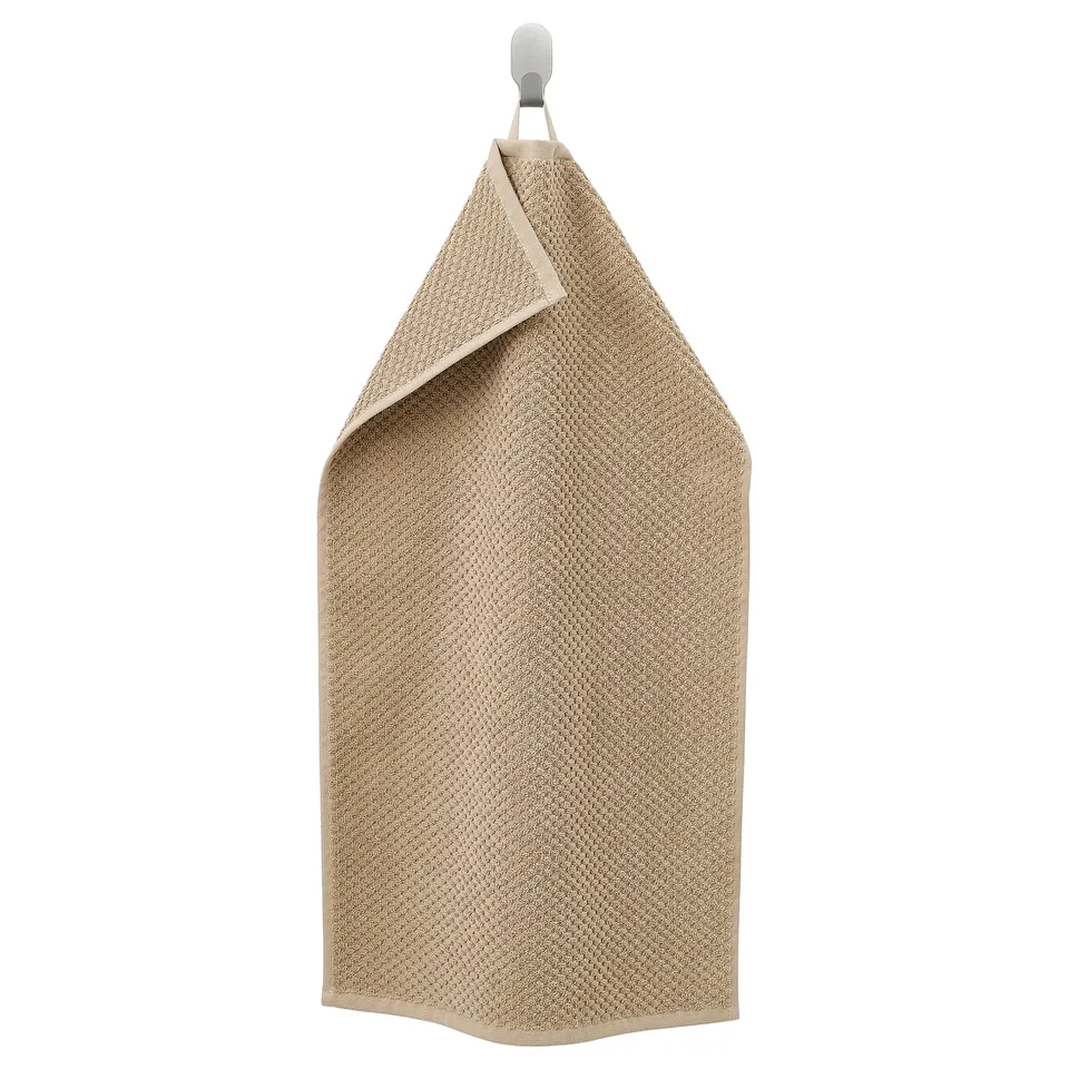 Beige GULVIAL towel, soft cotton, rectangular, thick, hanging.