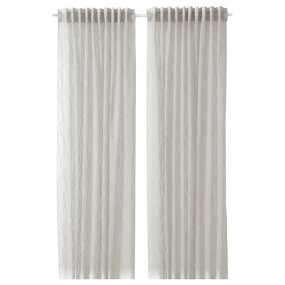 GLESGRÖE sheer curtains in grey, featuring a wave pattern, made from recycled polyester, hang straight.
