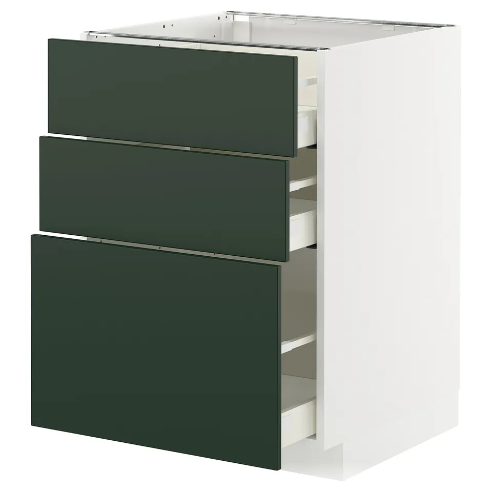 White METOD cabinet with 3 green drawers, partly open, sleek design, metallic handles, clean white & deep green.