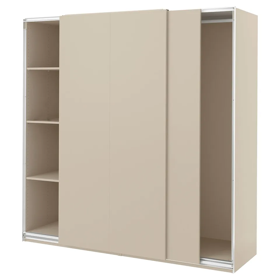 Beige PAX wardrobe with sliding doors, sleek modern look, three sections.