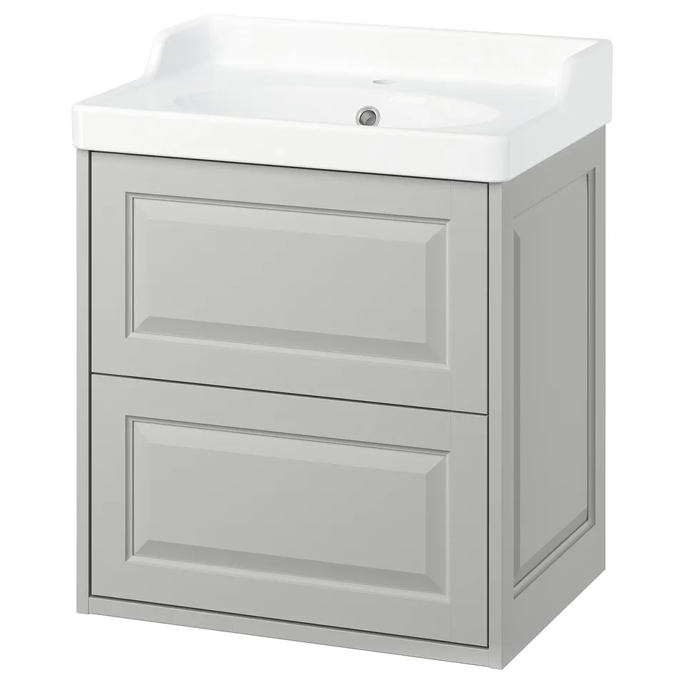 Elegant light grey bathroom vanity with drawers, sleek white basin. Modern, timeless design for storage.