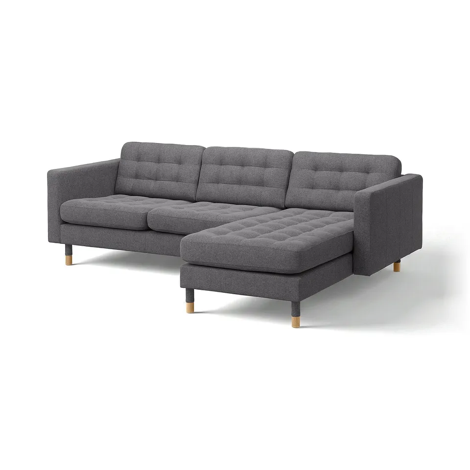 A modern grey LANDSKRONA sectional sofa with tufted cushions and wooden legs.