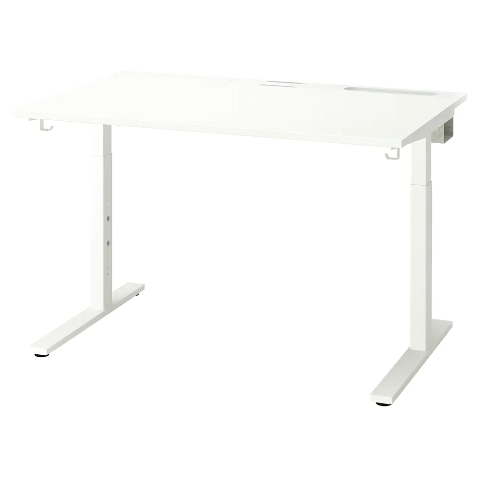 A white MITTZON desk with adjustable legs.