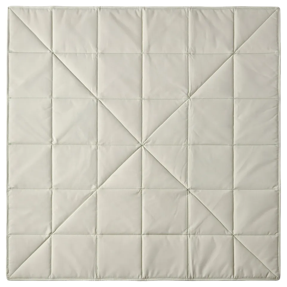 Light grey ikea GREJSIMOJS weighted blanket, square shape with crisscross design, soft texture.