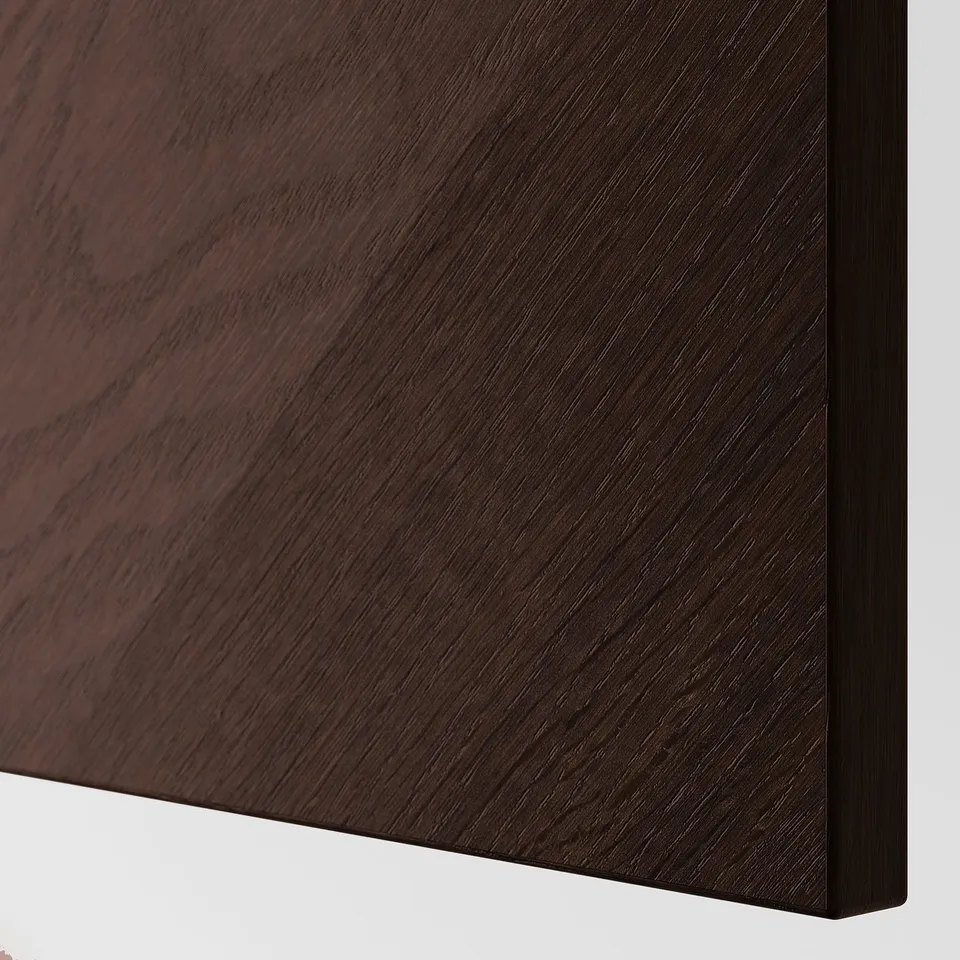 Close-up of dark wood grain texture on elegant, smooth furniture surface.