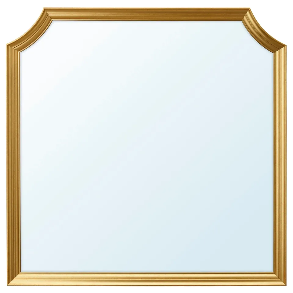 Golden-framed mirror with sleek, scalloped edges, reflecting light and adding elegance.