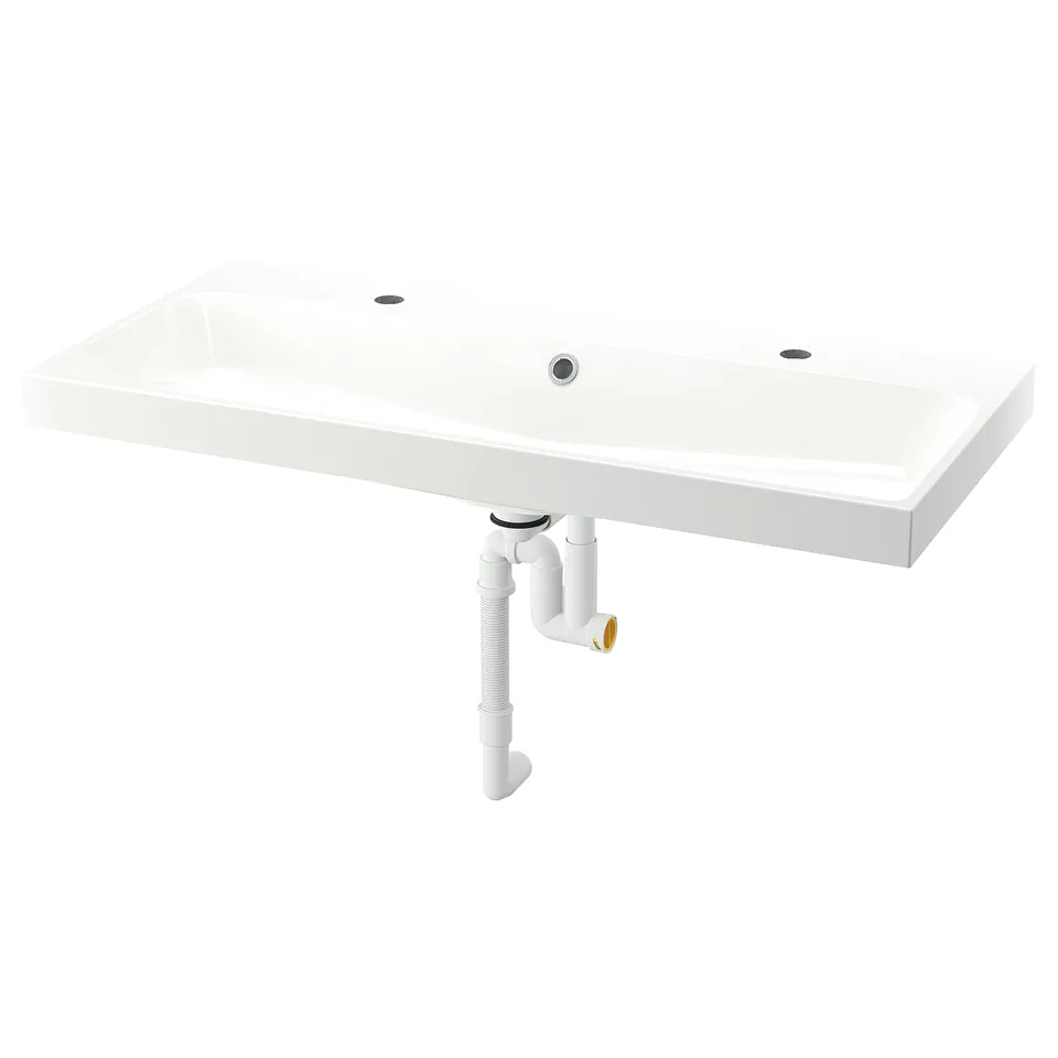 The BACKSJÖN is a sleek white marble basin with clean lines. Modern design, wall-mounted, glossy finish. It includes a water trap.