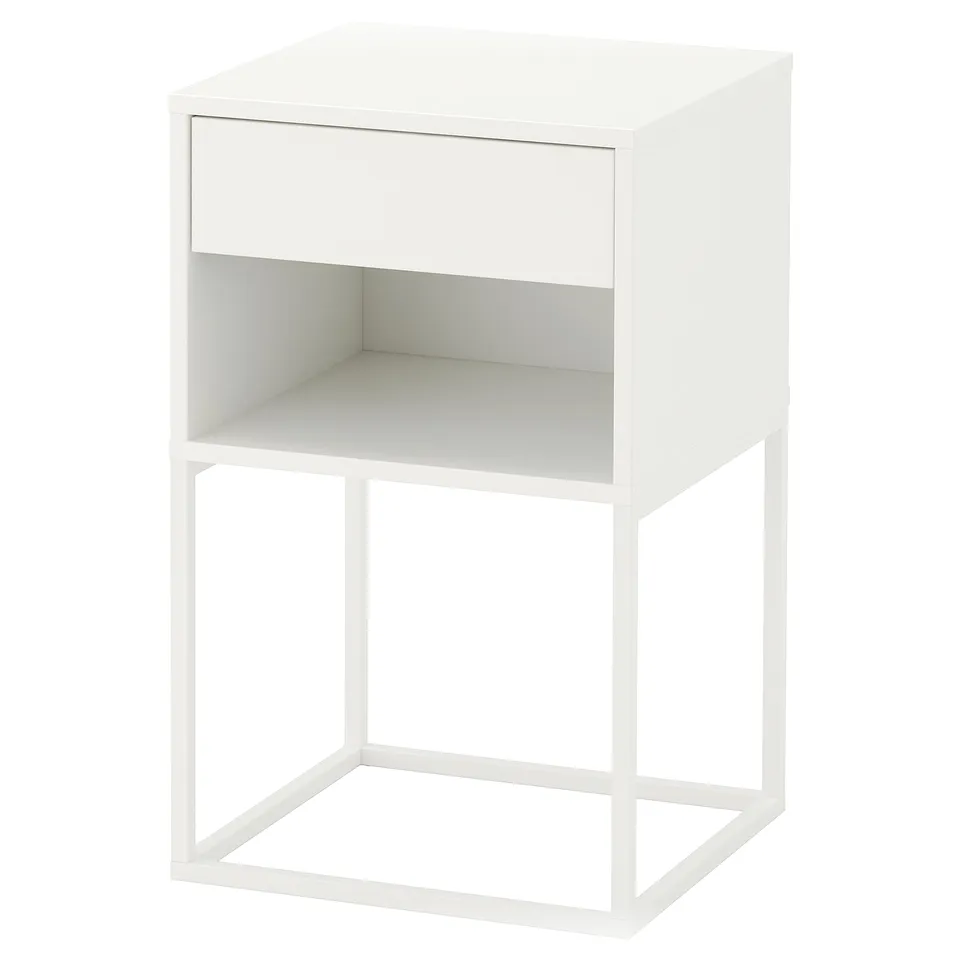A white VIKHAMMER bedside table with a drawer and open shelf. It has a sleek, modern design.