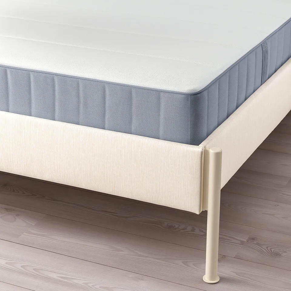 Bed with adjustable sides for varied mattress thickness, clean lines, and storage space under the frame.