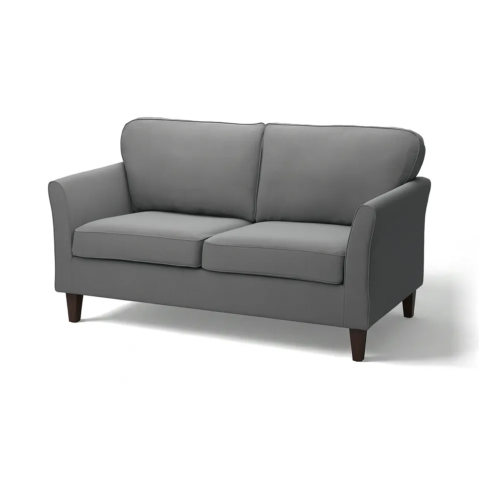 Modern grey loveseat couch, sleek & curved design, padded for comfort.