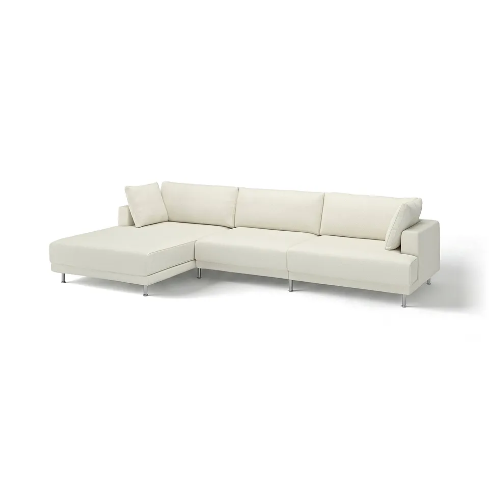 The UPPÅKRA sofa is a sleek, modern cream-colored sectional with clean lines and oversized cushions, resting on chrome legs.
