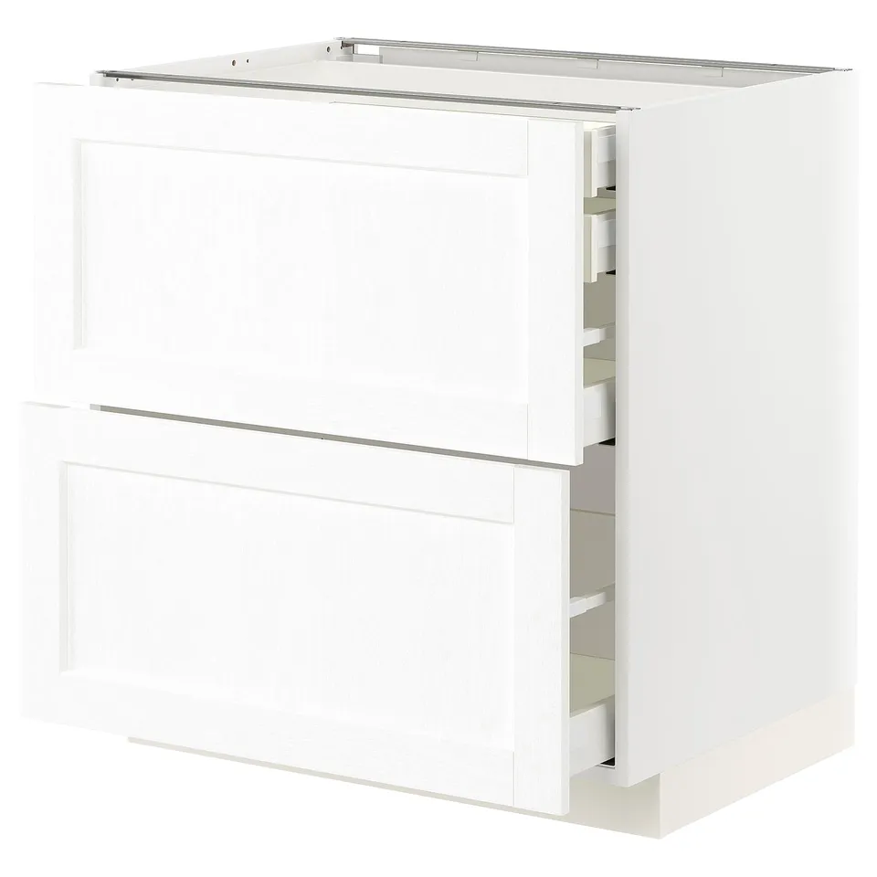 White METOD kitchen cabinet with multiple drawers and shelf.