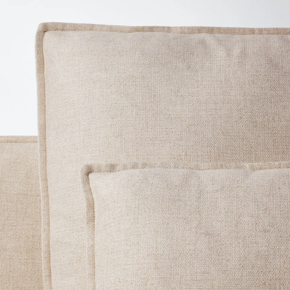 Modern light beige chaise longue, sleek and stylish. Upholstered in high-quality linen. Textured fabric. Low profile, perfect for relaxation.
