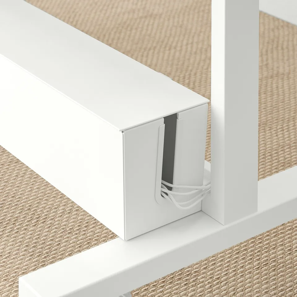 White MITTZON room divider with hidden cable management.