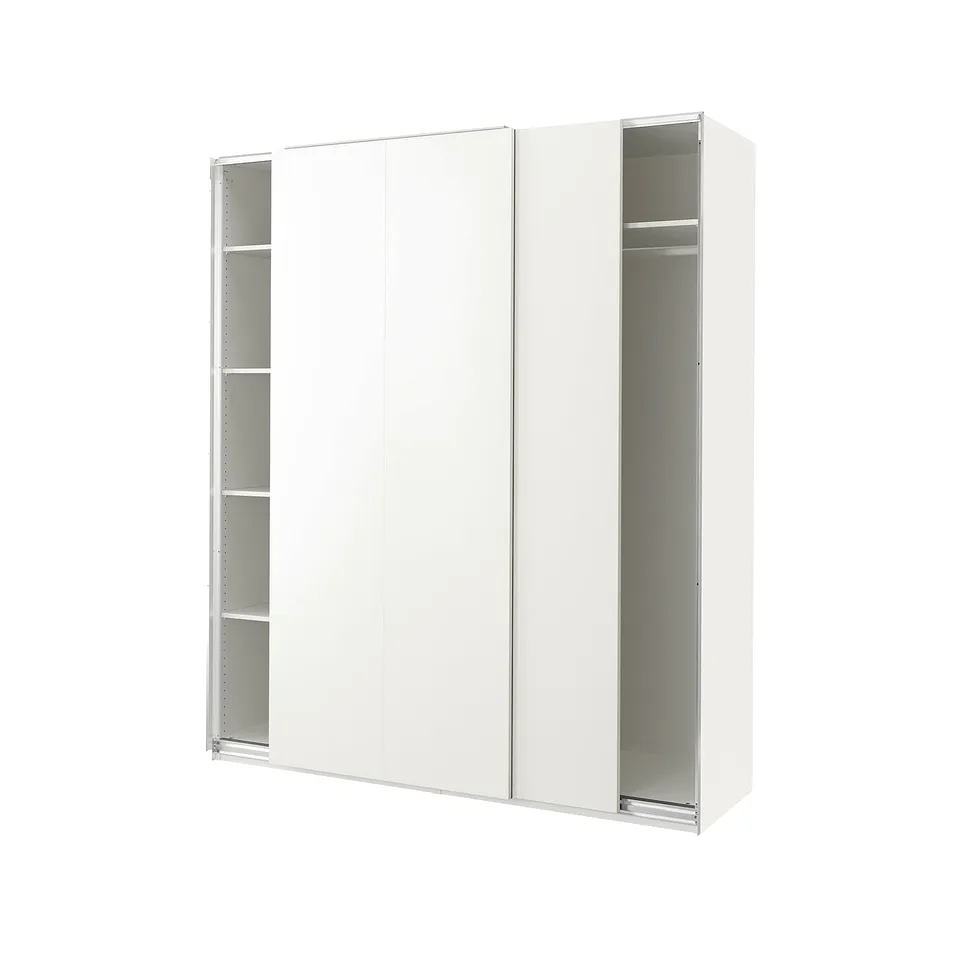 A white ikea PAX wardrobe with sliding doors and shelves. Its rectangular, modern, and minimalist in design.