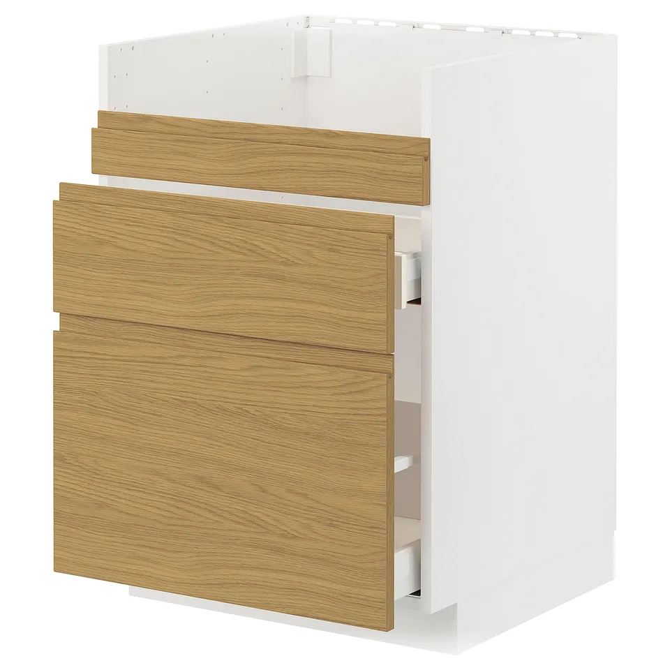 Modern kitchen unit with oak effect doors, white frame, minimalist design, drawers, and cabinets.